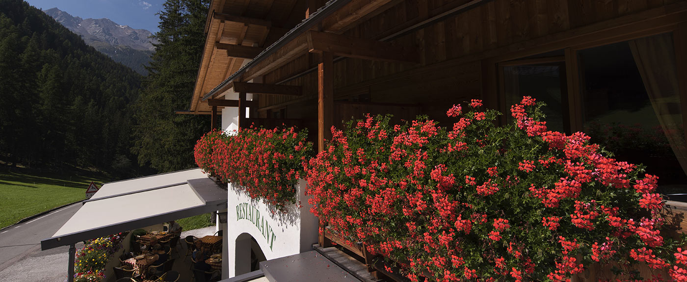 Beautiful geraniums on the balconies of Hotel Arnstein