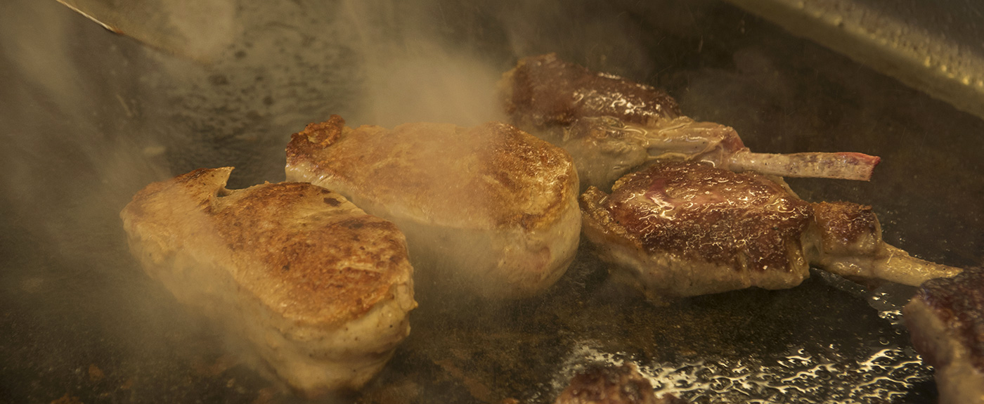 Steaks and knuckles are roasted in a pan