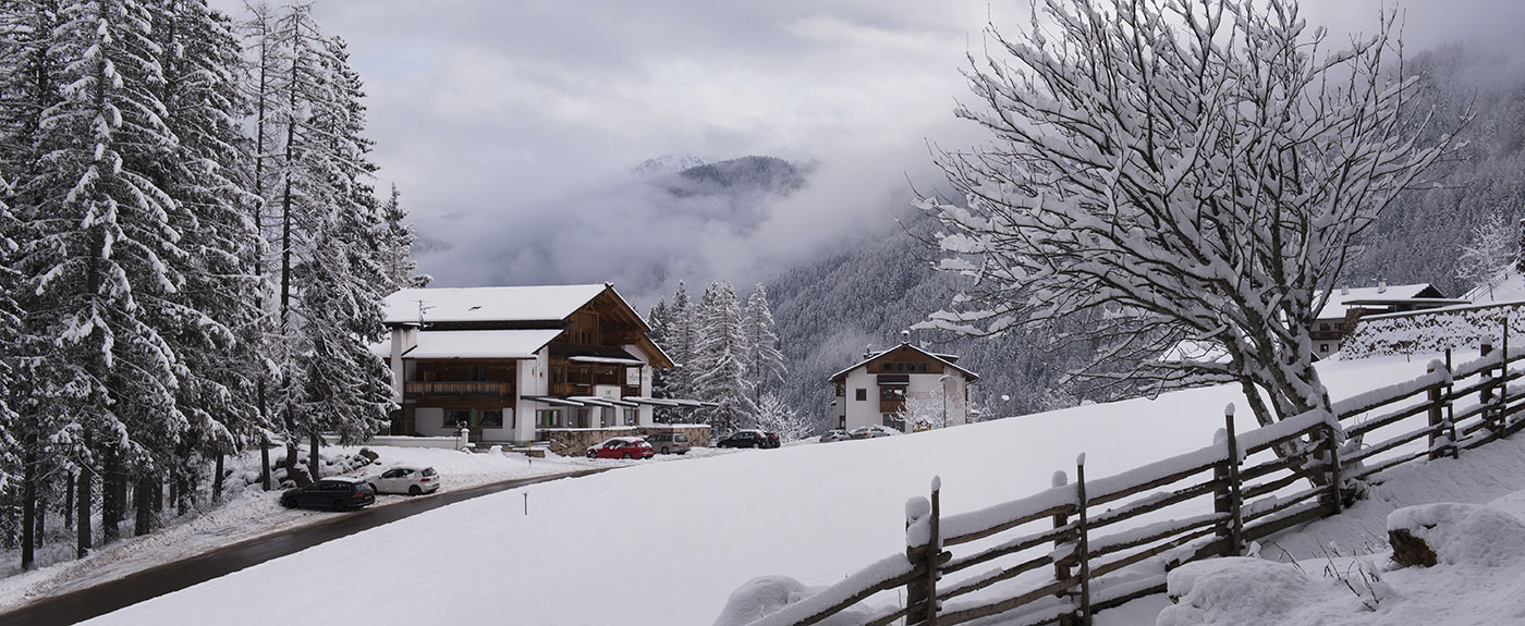 Hotel Arnstein amid the snowy landscape